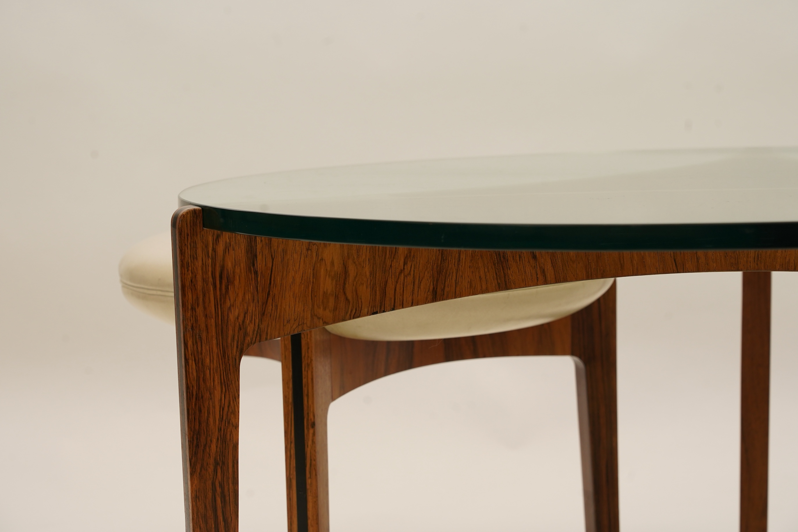 Sven Ellekaer (Danish, 1926-1984) for Christian Linneberg Møbelfabrik: A coffee table and three nesting stools ensuite